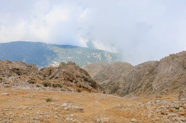 Very beautiful view from the top of Mount Tahtali or Olympos of the Kemer district of Antalya province in Turkey. A popular tourist spot for sightseeing and skydiving. Background or landscape
