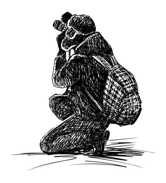 Фотограф делает фотографии
