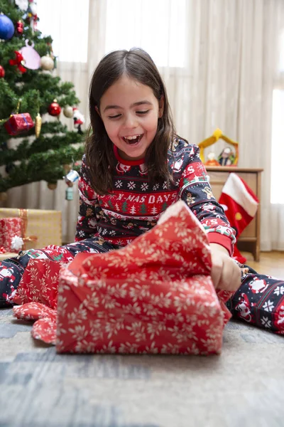 Very Happy Little Caucasian Girl Opening Christmas Presents Home — Stock Photo, Image