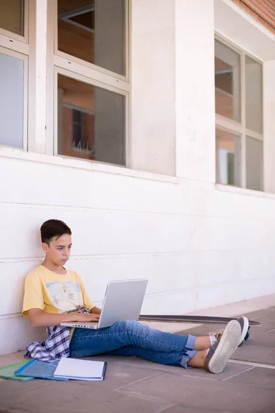 Caucasian Teenage Boy Sitting Floor Studying Laptop Space Text — Foto de Stock