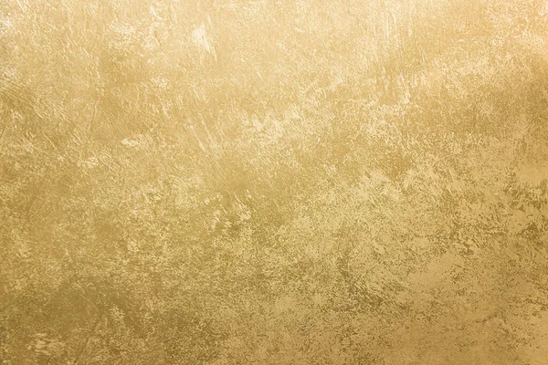 Eski sarı bir beton duvar. Çimento desenli sarı arkaplan.