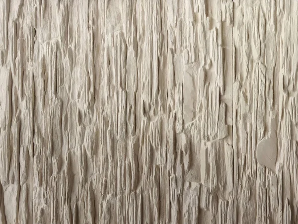 Alçı şeklinde gri rengin rahatlama dokusu. Alçıdan duvar yakın plan. Gri arkaplan..