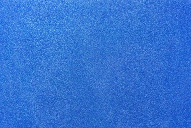 Pullu mavi arka plan. Kum taneli mavi köpüklü.