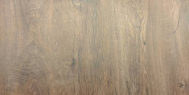 Yatay çizgileri olan kahverengi ahşap bir doku. Ahşap yüzey.