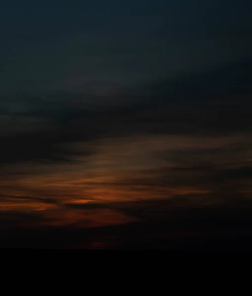 Sun Has Set Horizon High Clouds Cover Blue Sky Red — Stock Photo, Image