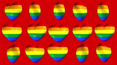 LGBTQ Gurur Bayrağı arka planında dönen gökkuşağı renkli kalpler. Gurur Ayı için tam HD ve döngü hareketi arkaplanı.