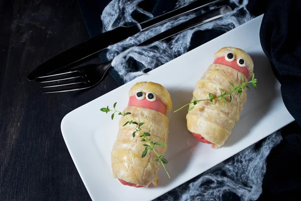 Halloween treat sausage in the dough — Stock Photo, Image