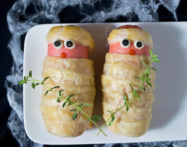 Halloween treat sausage in the dough — Stock Photo, Image