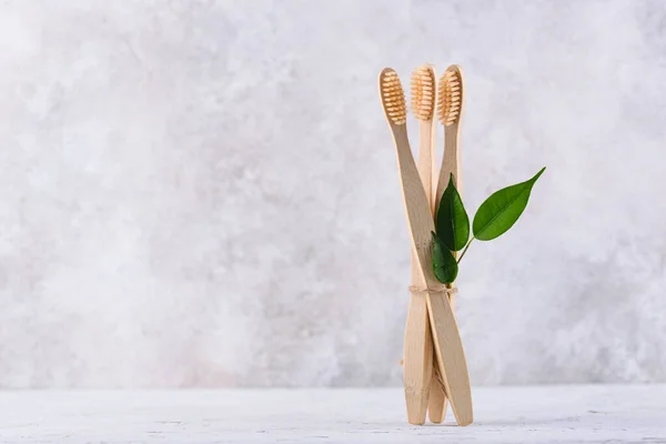 Bamboo toothbrush, zero waste care products — Stock Photo, Image