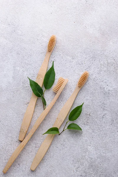 Bamboo toothbrush, zero waste care products — Stock Photo, Image