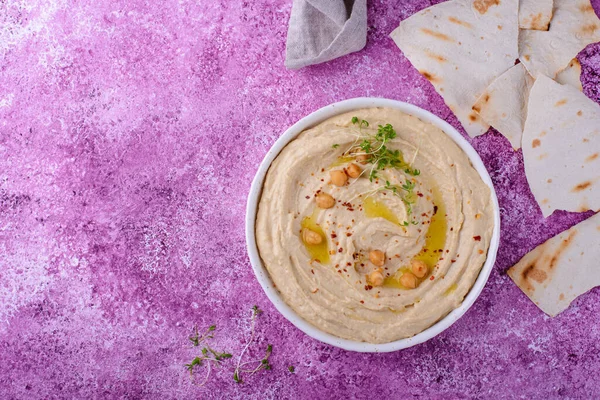 Hummus from chickpeas and pita flat bread. Healthy vegetarian food