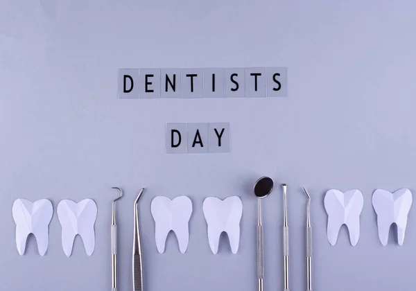 World dentists day concept with stomatology tools and teeth