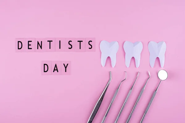 World dentists day concept with stomatology tools and teeth