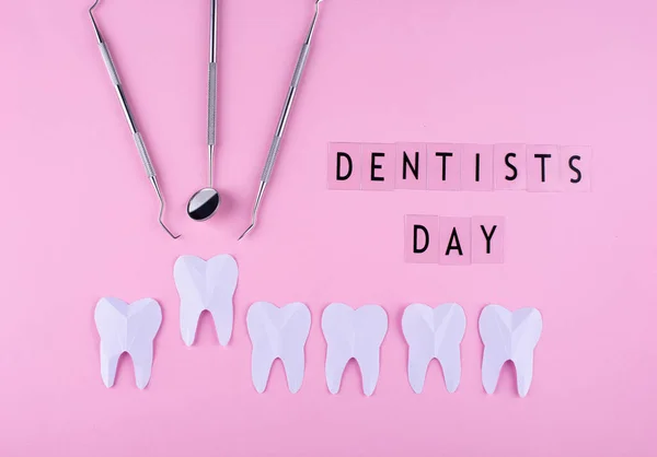 World dentists day concept with stomatology tools and teeth