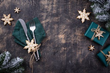 Christmas and New year table setting with gingerbread cookies
