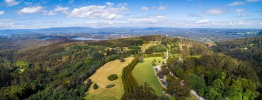 Wide aerial panorama of Dandenong Ranges in Victoria, Australia clipart