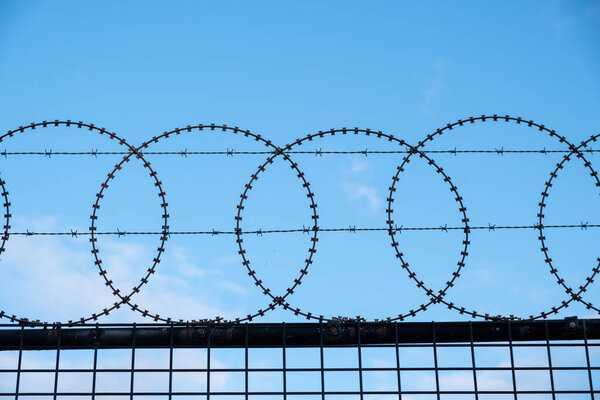 Barbed Wire Fence Blue Sky Copy Space Royalty Free Stock Photos