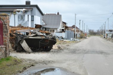 Dmytrivka village, Kyiv region, Ukraine - April 13, 2022: Destroyed infantry fighting vehicle of the Russian army following the Ukrainian forces counter-attacks. War of Russia against Ukraine.
