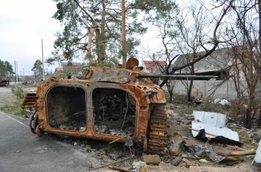 Dmytrivka village, Kyiv region, Ukraine - April 13, 2022: Destroyed infantry fighting vehicle of the Russian army following the Ukrainian forces counter-attacks. War of Russia against Ukraine.