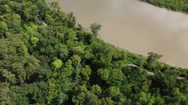flying over river and forest at Beaudry Provincial Park in Manitoba in the summer