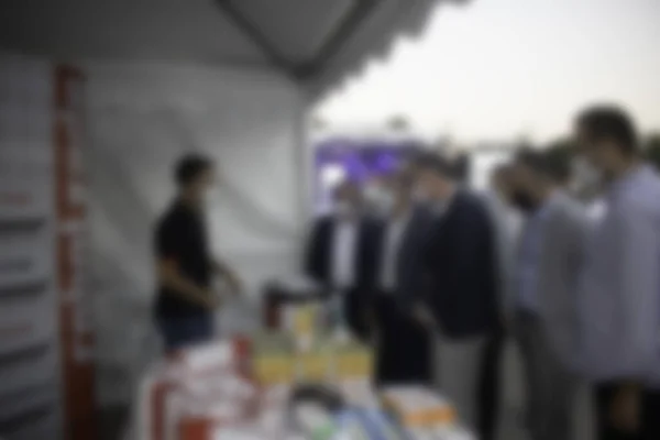 Blurred business people in the fair.