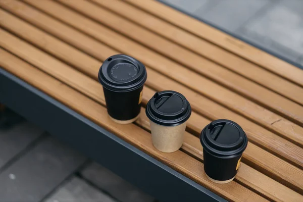 Paper Cup Coffee Lid Standing Park Bench Summer Day Rays — Stockfoto