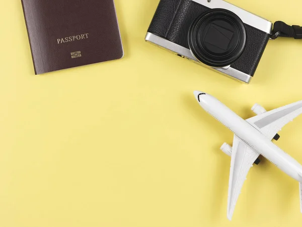 Top View Flat Lay Passport Camera Airplane Model Yellow Background — Stock Photo, Image