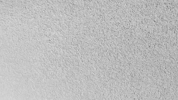 Tekstur latar belakang putih Gerakan cepat kamera sepanjang dinding plester dan bata putih — Stok Video
