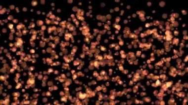 Bokeh altın parçacıkları güzel, parlak arka plandan aşağı düşüyor. Yüksek kalite 4k görüntü