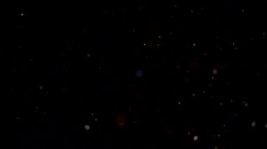 Havada yüzen gerçek toz parçacıkları. Organik sinematik efektler arka planda Makro Yavaş Hareket Kırmızı Kamera. Yüksek kalite 4K görüntü