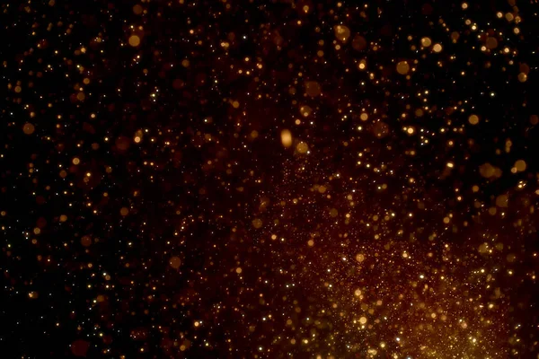 Siyah Zemin Üzerinde Yüzen Doğal Organik Altın Toz Parçacıkları Parıldayan — Stok fotoğraf