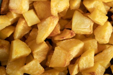 Macro close-up of homemade baked potatoes. 