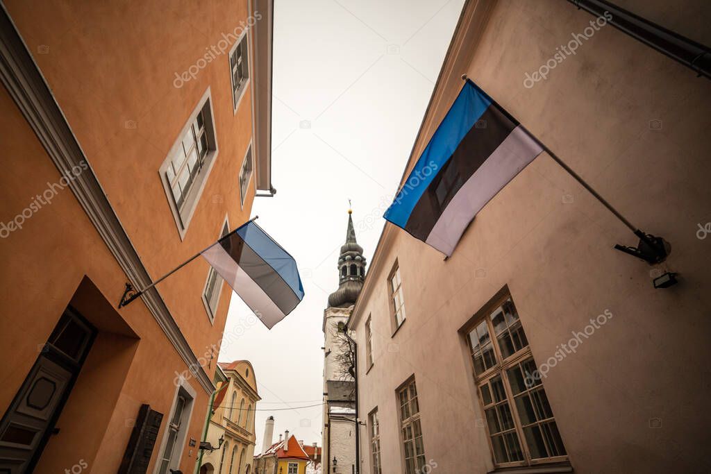 Estonan flags on the walls of old Tallinn town's houses, Estonia