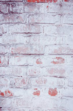 kırmızı ve beyaz boyalı tuğla duvar 