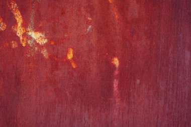 Çizik ve çatlaklarla paslı metal doku.