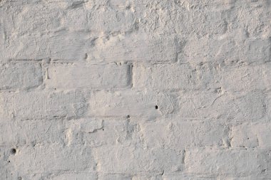 Çatlakları ve çizikleri olan eski beton duvarın dokusu arka plan olarak kullanılabilir.