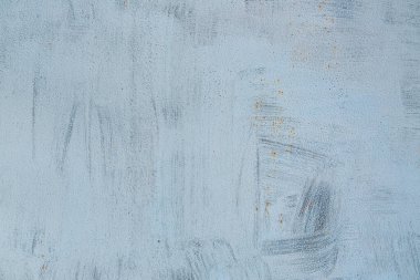 Çatlakları ve çizikleri olan beton bir duvarın dokusu arka plan olarak kullanılabilir.