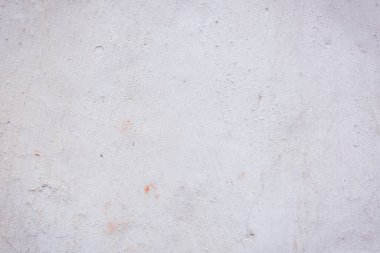 Çatlakları ve çizikleri olan eski beton duvarın dokusu arka plan olarak kullanılabilir.