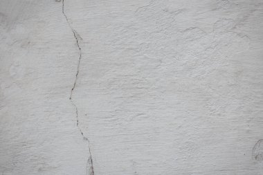 Eski duvarın çatlakları ve çizikleri arka plan olarak kullanılabilir.