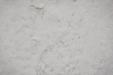 Çatlakları ve çizikleri olan beton duvar dokusu arka plan olarak kullanılabilir.