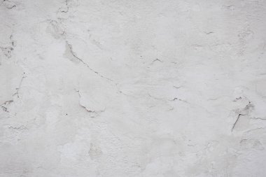 Çatlakları ve çizikleri olan beton duvar dokusu arka plan olarak kullanılabilir.