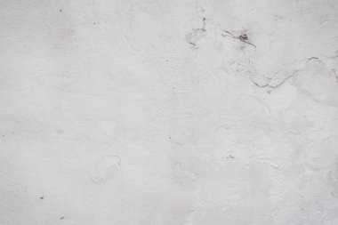 Çatlakları ve çizikleri olan beton duvar dokusu arka plan olarak kullanılabilir.