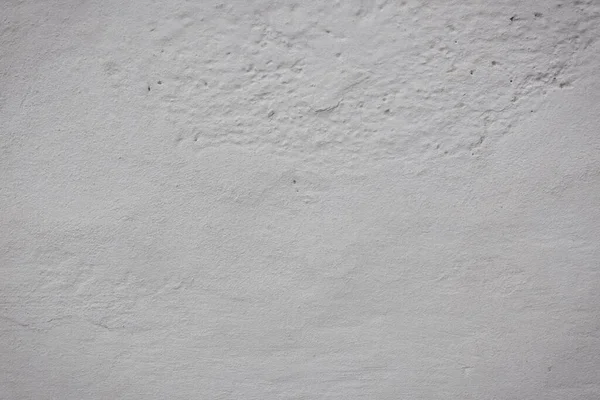 Çatlakları ve çizikleri olan beton bir duvarın dokusu arka plan olarak kullanılabilir.