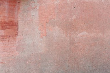 Çatlakları ve çizikleri olan eski bir duvarın dokusu arka plan olarak kullanılabilir.