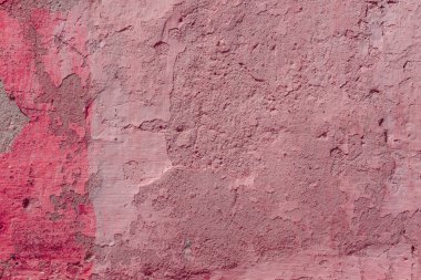 Kırmızı boyayla kaplı bir duvarın dokusu