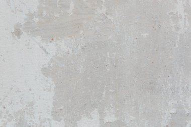 Çatlakları ve çizikleri olan beton bir duvarın dokusu arka plan olarak kullanılabilir.