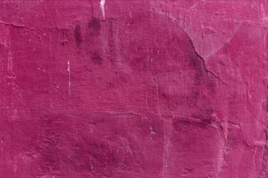 Çatlakları ve çizikleri olan eski beton duvarın dokusu arka plan olarak kullanılabilir.