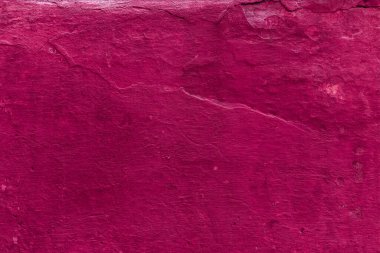 Çatlakları ve çizikleri olan eski beton duvarın dokusu arka plan olarak kullanılabilir.