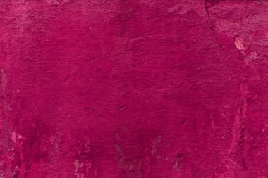 Çatlakları ve çizikleri olan eski beton duvarın dokusu arka plan olarak kullanılabilir.