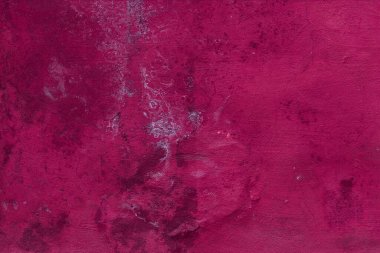 Çatlakları ve çizikleri olan eski beton duvarın dokusu arka plan olarak kullanılabilir.